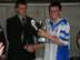 Captain Declan McCormack Accepts Cup